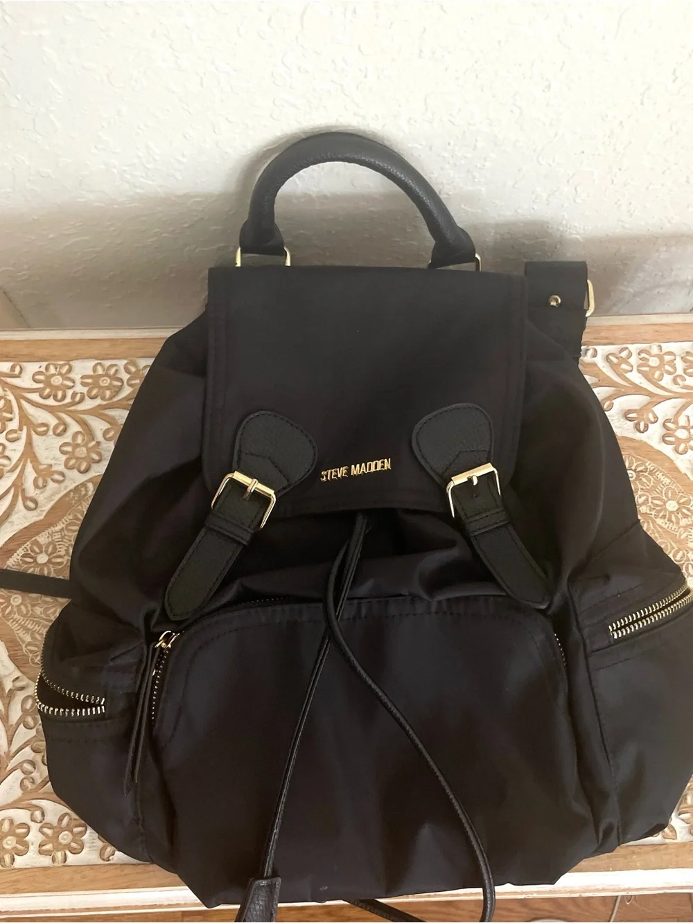 Steve Madden Black Nylon Drawstring Backpack with Gold Accents